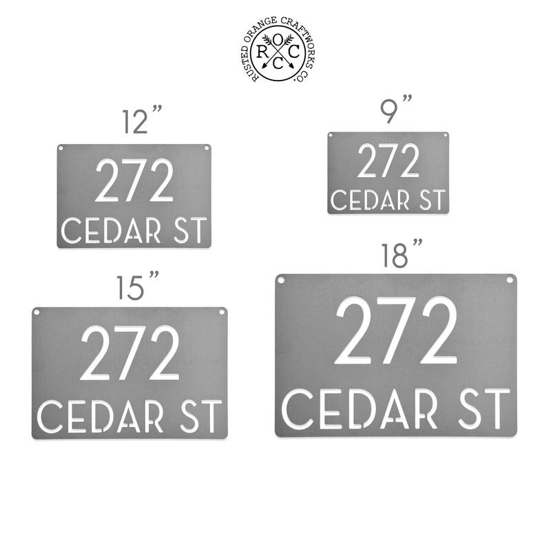 4 metal rectangle signs with home address showing size comparison.