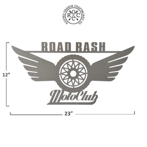 Metal motorcycle sign showing dimensions of 12 inches tall by 23 inches wide.