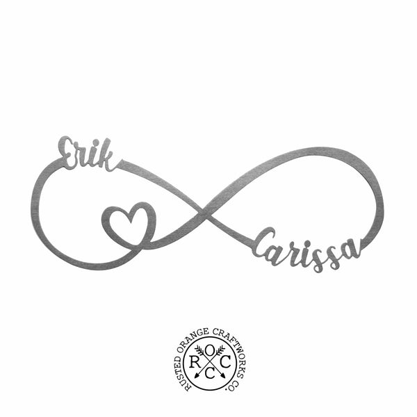 picture of metal infinity sign with personalization Erik and Carissa and heart cut out on a white background with Rusted Orange Craftworks Logo