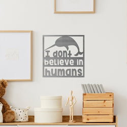 Narwhal sign on wall above counter
