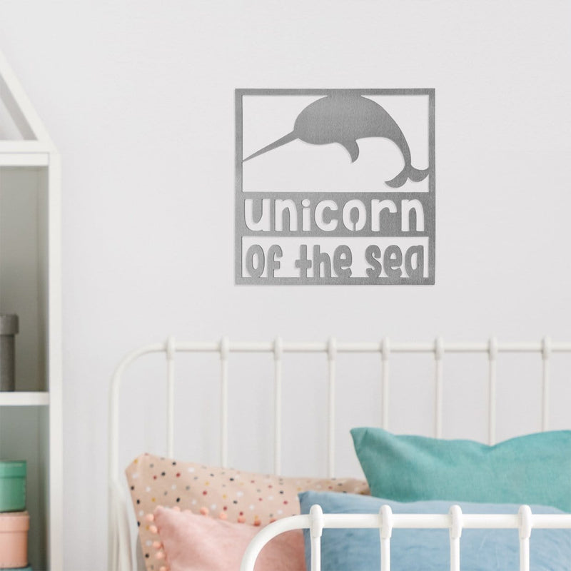 Narwhal sign on wall in bedroom
