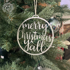 merry christmas ya'll ornament hanging on christmas tree