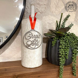 christ the lord ornament on bottle