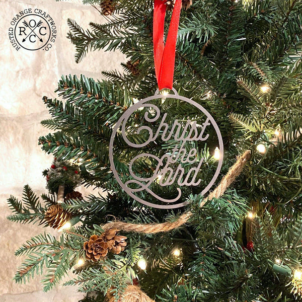 christ the lord ornament on christmas tree