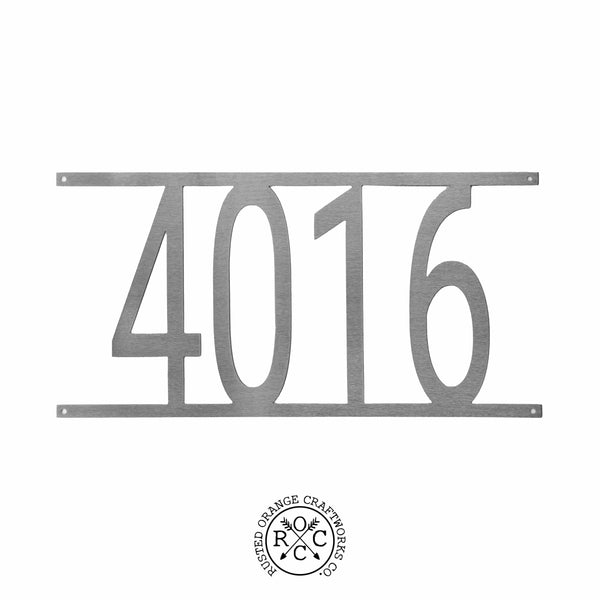 Custom metal house number shown against white background.