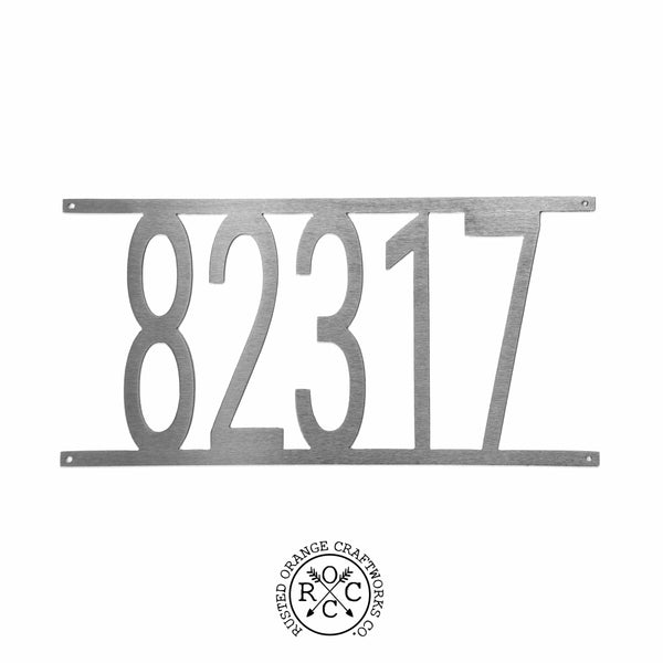 Custom metal house number shown against white background.
