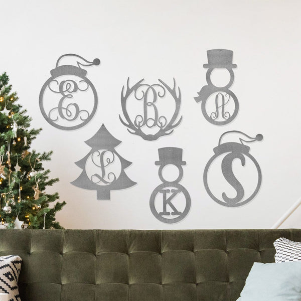 holiday monogram collection on wall