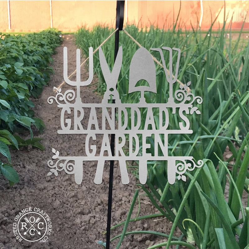 Grand dad's garden sign on garden post