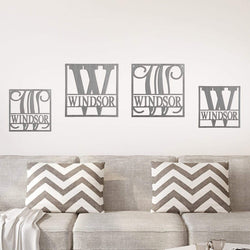 monogram signs on wall