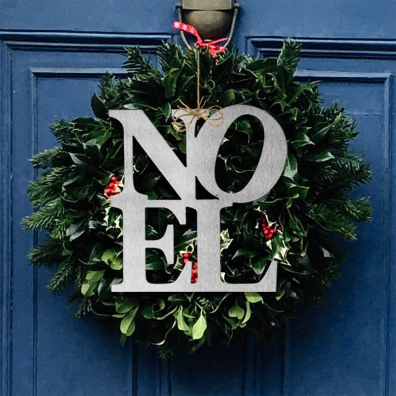 noel sign on front door wreath