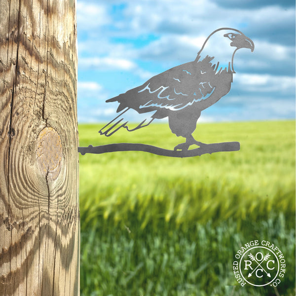 Bald eagle tree stake in post
