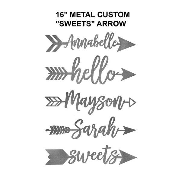 5 metal arrows with name or word etched in center shown against white background.
