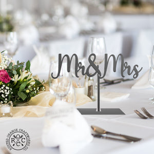 mr & mrs sign on dining table at wedding