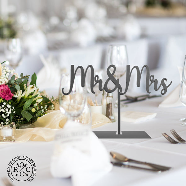 mr & mrs sign on dining table at wedding