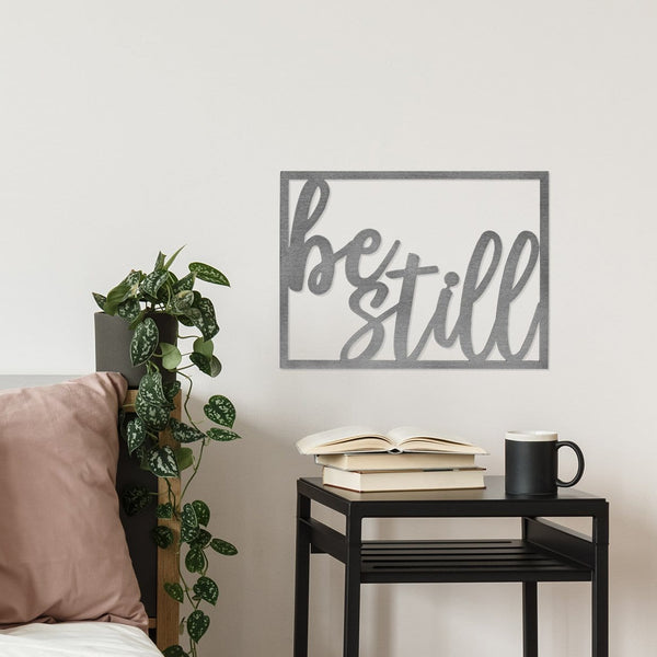 be still sign on wall