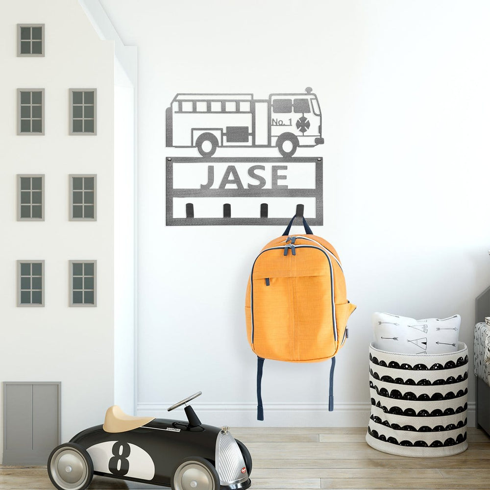 work truck sign on wall with backpack hanging on it