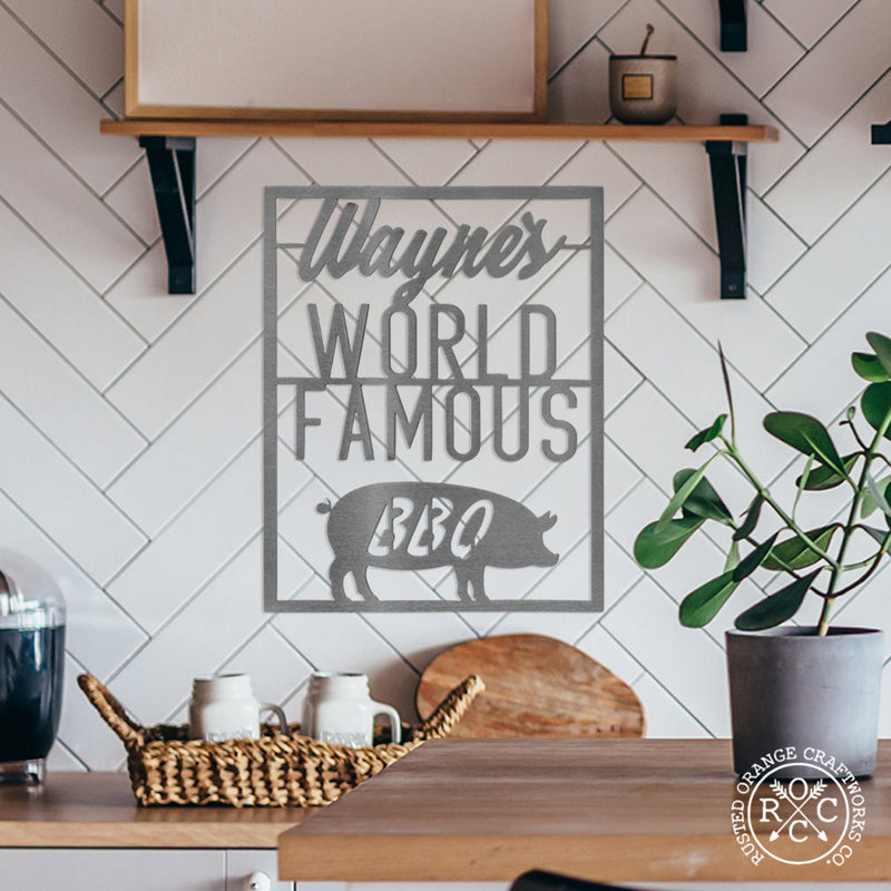 world famous bbq sign above kitchen counter