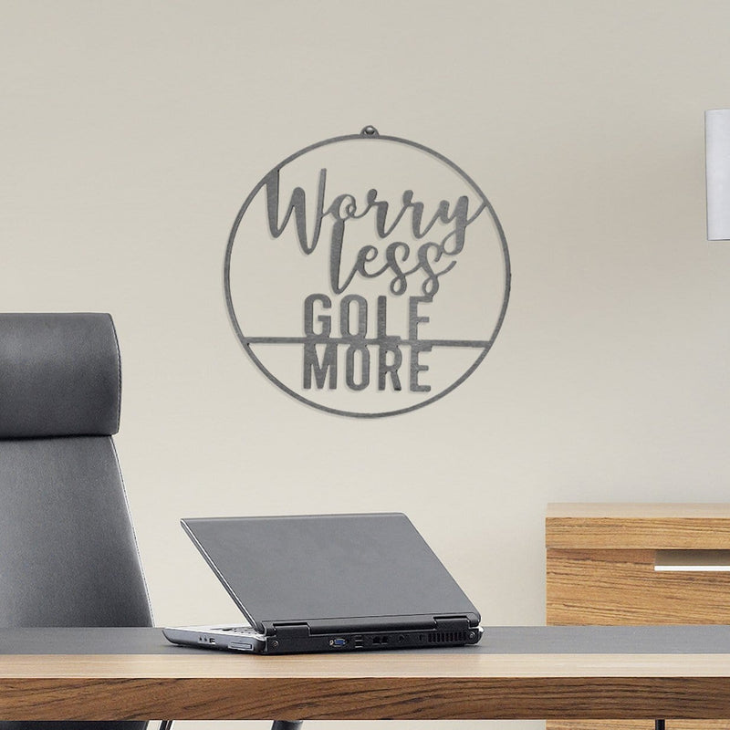 Worry less golf more sign on wall above desk
