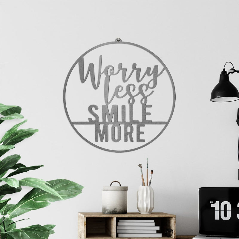 worry Less smile more sign on wall